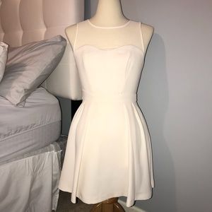 BCBG white mini dress with mesh detail